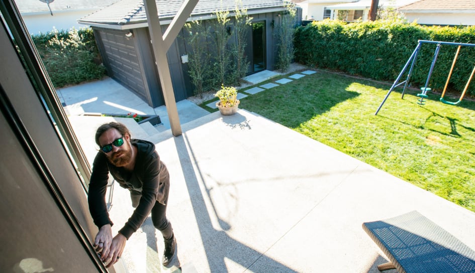 Burglar getting into a back door